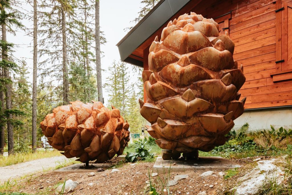 large-whitebark-pinecone-scultpture-made-of-metal-on-display-in-mount-revelstoke-national-park-british-columbia-by-canadian-artist-kyle-thornley