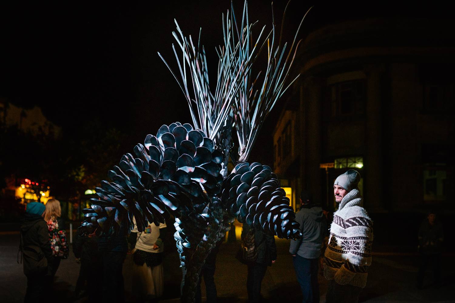 large-metal-large-pinecone-scultpure-downtown-revelstoke-at-night-during-luna-art-festival